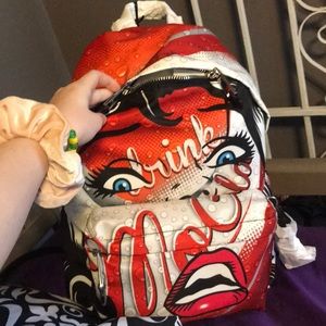 Red black & white designer moschino backpack